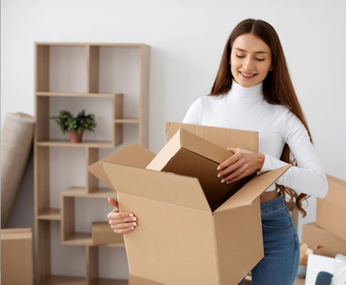 Image of a tenant packing up to move